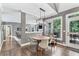 Cozy dining area adjacent to the kitchen, featuring a round table and access to outdoor seating at 4045 Bridle Ridge Dr, Suwanee, GA 30024