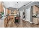 Updated kitchen featuring wood cabinets, granite countertops, a large island, and stainless-steel appliances at 4045 Bridle Ridge Dr, Suwanee, GA 30024