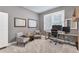 Cozy home office offers a comfortable workstation with natural light, neutral decor, and ample desk space at 4045 Bridle Ridge Dr, Suwanee, GA 30024