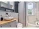 Stylish bathroom features a vessel sink, subway tile, and modern fixtures at 61 16Th Ne St # 4, Atlanta, GA 30309