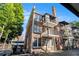 Three-story brick apartment exterior boasts upper level balconies and architectural details at 61 16Th Ne St # 4, Atlanta, GA 30309