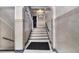 Classic entry hallway featuring marble wainscotting and a staircase at 61 16Th Ne St # 4, Atlanta, GA 30309