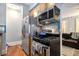 Efficient kitchen with stainless steel appliances, granite countertops, and a gas range at 61 16Th Ne St # 4, Atlanta, GA 30309