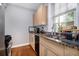 Bright kitchen features granite countertops, stainless steel appliances, and a double sink at 61 16Th Ne St # 4, Atlanta, GA 30309