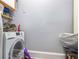 Functional laundry area featuring a modern front-load washer for efficient cleaning at 61 16Th Ne St # 4, Atlanta, GA 30309
