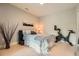Comfortable bedroom featuring a bed, exercise bike, and neutral decor, creating a versatile and inviting space at 775 Juniper Ne St # 612, Atlanta, GA 30308