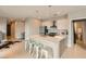 Modern kitchen with white cabinets, a large island, stainless steel appliances, and an open floor plan at 775 Juniper Ne St # 612, Atlanta, GA 30308