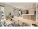 Bright and airy living room with floor-to-ceiling windows, modern furnishings, and an open layout at 775 Juniper Ne St # 612, Atlanta, GA 30308