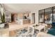 A bright living space featuring an open floor plan with a modern kitchen and stylish furnishings at 775 Juniper Ne St # 612, Atlanta, GA 30308