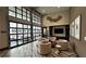 Inviting resident lounge featuring modern seating, stylish decor, and garage-style windows at 775 Juniper Ne St # 612, Atlanta, GA 30308