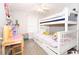 Bright bedroom with bunkbeds, a desk, and cheerful decor, perfect for a space at 9155 Nesbit Ferry Rd, Alpharetta, GA 30022