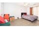 Bedroom with a single bed, wood-look floors, and ample space, perfect for relaxation and personalization at 9155 Nesbit Ferry Rd, Alpharetta, GA 30022
