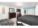 A spacious main bedroom offering carpeting, furnishings, closet and exterior access at 9155 Nesbit Ferry Rd, Alpharetta, GA 30022