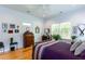 Cozy bedroom featuring hardwood floors, natural light, and ample space for relaxation at 1143 Church Nw St, Atlanta, GA 30318