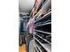 Walk-in closet featuring custom shelving and ample storage for shoes, clothes and accessories at 1143 Church Nw St, Atlanta, GA 30318