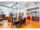 Open dining room with views of the living room and ample natural light and furnishings at 1143 Church Nw St, Atlanta, GA 30318