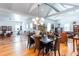 Open-concept dining area with vaulted ceiling, modern lighting, and views of living spaces at 1143 Church Nw St, Atlanta, GA 30318