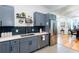Charming kitchen with custom cabinets, stainless steel appliances, and a view to the dining room at 1143 Church Nw St, Atlanta, GA 30318
