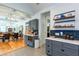 Bright kitchen with stainless steel appliances, custom cabinetry, and access to dining area at 1143 Church Nw St, Atlanta, GA 30318