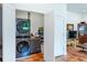 Functional laundry closet with stacked washer and dryer for space-saving convenience at 1143 Church Nw St, Atlanta, GA 30318
