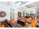 Spacious living area flows to an open-plan kitchen, with hardwood floors and exposed ductwork adding industrial charm at 1143 Church Nw St, Atlanta, GA 30318