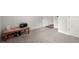 Finished basement area with carpet, white trim, and neutral paint at 1511 Arica Ave, Lawrenceville, GA 30043