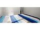 A single bed in a bedroom featuring natural light at 1511 Arica Ave, Lawrenceville, GA 30043