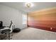 This office space features a desk, chair, and an accent wall at 1511 Arica Ave, Lawrenceville, GA 30043
