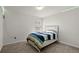 This bedroom is bright with a single bed and a window at 1511 Arica Ave, Lawrenceville, GA 30043