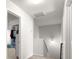 Upstairs hallway offering access to rooms and storage spaces at 1511 Arica Ave, Lawrenceville, GA 30043