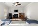 Cozy living room features a fireplace and a comfortable sectional sofa at 1511 Arica Ave, Lawrenceville, GA 30043