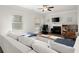 Spacious living room boasts a fireplace and comfortable sectional sofa at 1511 Arica Ave, Lawrenceville, GA 30043