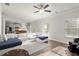 Bright, open living space featuring hardwood floors and a comfortable sectional sofa at 1511 Arica Ave, Lawrenceville, GA 30043