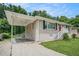 A lovely single-story home with attached carport and well-manicured lawn at 3204 Robin Rd, Decatur, GA 30032