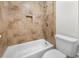 Bathroom featuring a tiled shower/tub combo and white toilet at 1538 Chantilly Ne Dr # 224, Atlanta, GA 30324