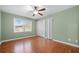 Well-lit bedroom with wood floors, large window, and closet space at 1538 Chantilly Ne Dr # 224, Atlanta, GA 30324