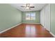 Bedroom featuring a ceiling fan, large window, and walk-in closet at 1538 Chantilly Ne Dr # 224, Atlanta, GA 30324