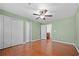 Spacious bedroom features wood floors, large closets, and a ceiling fan at 1538 Chantilly Ne Dr # 224, Atlanta, GA 30324