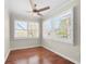 Bedroom featuring hardwood floors, plantation shutters, and a ceiling fan at 1538 Chantilly Ne Dr # 224, Atlanta, GA 30324