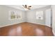 Bright bedroom featuring two large windows and a walk-in closet at 1538 Chantilly Ne Dr # 224, Atlanta, GA 30324