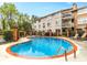 Inviting community pool with ample lounge seating and a well-maintained building backdrop for summer fun at 1538 Chantilly Ne Dr # 224, Atlanta, GA 30324