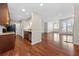 Kitchen with hardwood floors, updated appliances, and a view into the open living room at 1538 Chantilly Ne Dr # 224, Atlanta, GA 30324