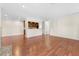 Bright living room features hardwood floors, an open kitchen and dining area, and neutral paint at 1538 Chantilly Ne Dr # 224, Atlanta, GA 30324