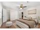 Bright main bedroom featuring a ceiling fan, ensuite bathroom, and walk-in closet at 1538 Chantilly Ne Dr # 224, Atlanta, GA 30324