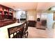 Basement bar area featuring custom cabinets, a stainless steel refrigerator, and ample counter space at 3320 Bryant Ln, Marietta, GA 30066