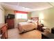 Comfortable basement bedroom featuring warm lighting, a window, and neutral-toned decor at 3320 Bryant Ln, Marietta, GA 30066