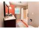 Bathroom featuring hardwood floors, large vanity and shower with a tub at 3320 Bryant Ln, Marietta, GA 30066