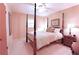 Bedroom featuring a four-poster bed, neutral carpet and lots of natural light at 3320 Bryant Ln, Marietta, GA 30066