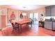 Dining room featuring hardwood floors and access to the outdoor screened porch at 3320 Bryant Ln, Marietta, GA 30066