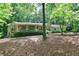 Charming single-story home featuring a welcoming front porch and lush, mature landscaping at 3320 Bryant Ln, Marietta, GA 30066